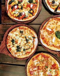 Close-up of pizza served on table