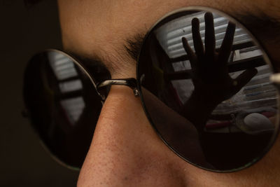 Close-up of man wearing sunglasses