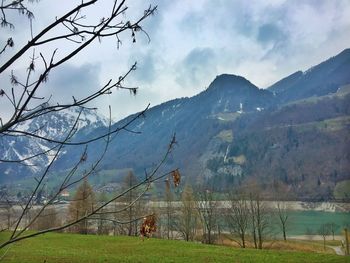 Scenic view of mountain by lake