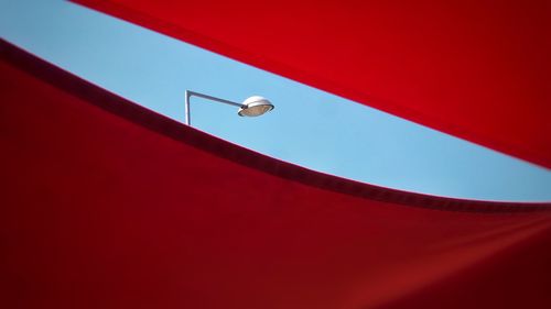 Low angle view of electric light against clear sky