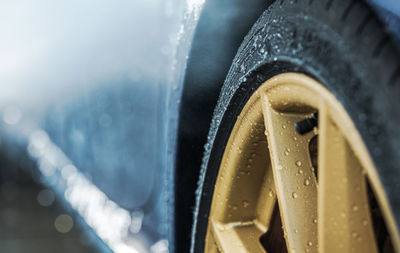 Close-up of wet tire in car