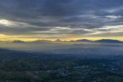 Scenic view of landscape against sky during sunset