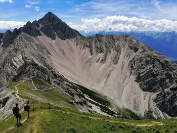 Panoramic view of mountain range against sky