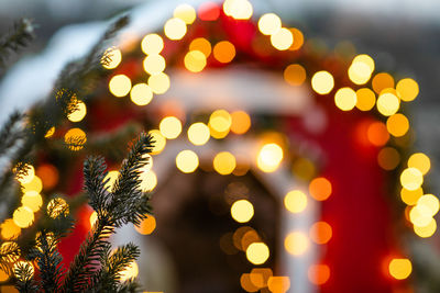 Defocused image of illuminated christmas tree