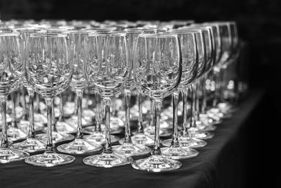 Close-up of wineglasses on table