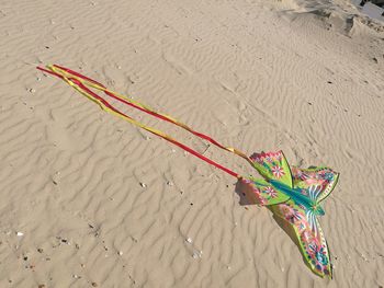 High angle view of kite on a sunny beach