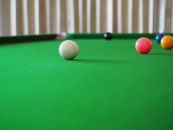 Multi colored balls on pool table