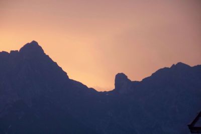 Scenic view of mountains at sunset