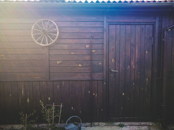 Bicycle by door of building