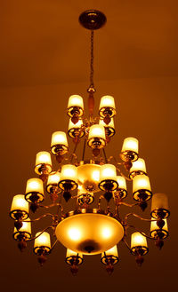 Low angle view of illuminated lamp