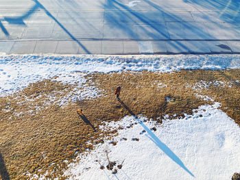 High angle view of snow covered field