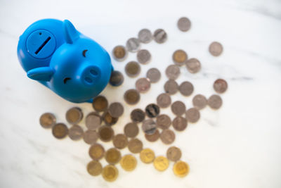 High angle view of coins on table