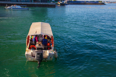 People on boat in sea