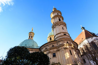 Low angle view of building against blue sky