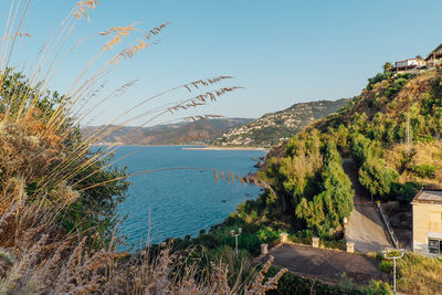 Scenic view of sea against clear blue sky