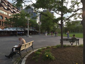 People relaxing in park