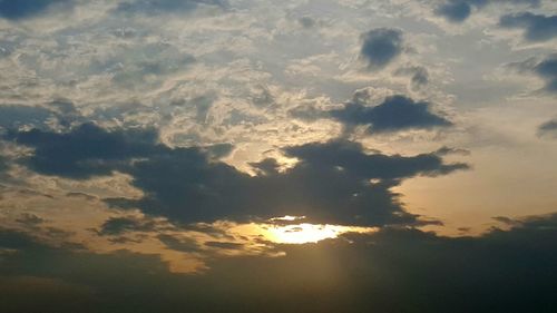 Low angle view of cloudy sky during sunset