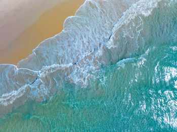 Sea surface aerial view,bird eye view photo of waves and water surface texture,amazing sea beach 