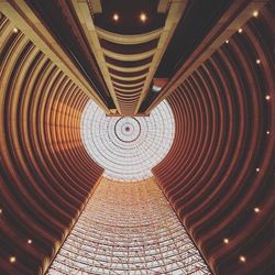 Low angle view of illuminated ceiling