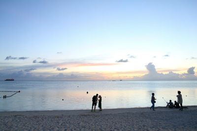 Scenic view of sea at sunset