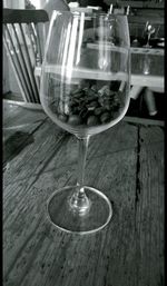 Close-up of wine in glass on table