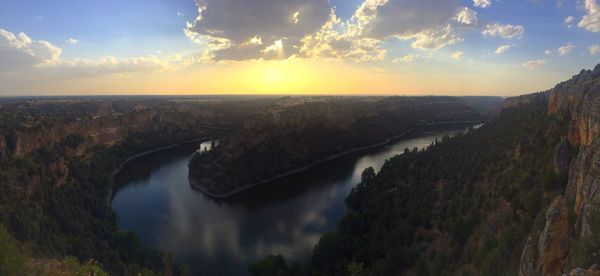 High angle view of river against sky during sunset