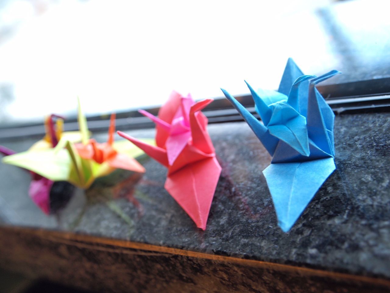 close-up, focus on foreground, multi colored, hanging, still life, selective focus, clothesline, paper, no people, in a row, art and craft, variation, creativity, clothespin, day, large group of objects, colorful, blue, group of objects, decoration