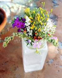 High angle view of flower vase on table