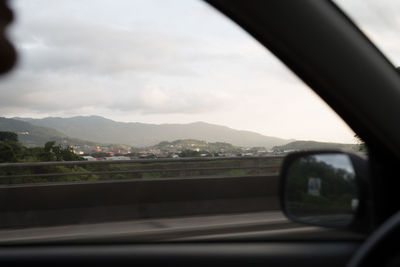 Road seen through car windshield