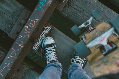 Low section of man with skateboard