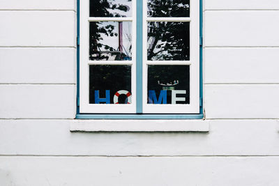 Cropped view of window on house