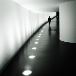 People walking in corridor