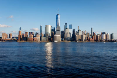 New york city manhattan skyline daytime with one world trade center tower across hudson river