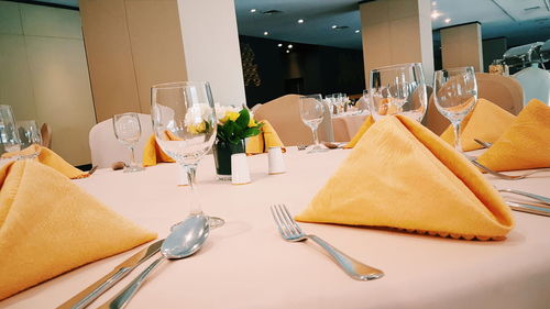 Place setting on table at restaurant