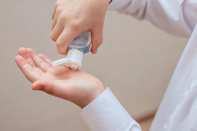 Close-up of human hand holding hands