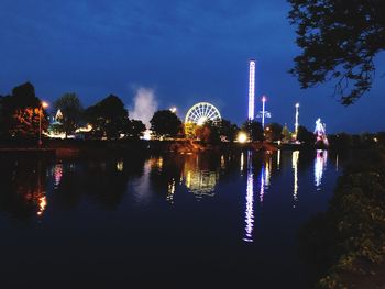 Reflection of illuminated buildings in water