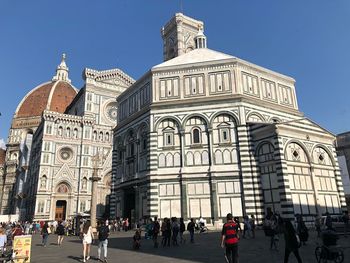 Group of people in front of building