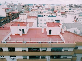 High angle view of residential buildings in city