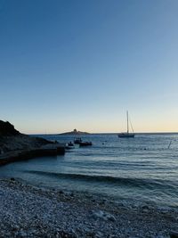 Scenic view of sea against clear sky