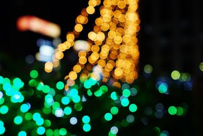 Close-up of illuminated christmas tree at night