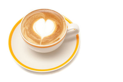 Close-up of coffee cup against white background