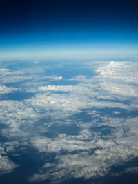 Aerial view of clouds against blue sky