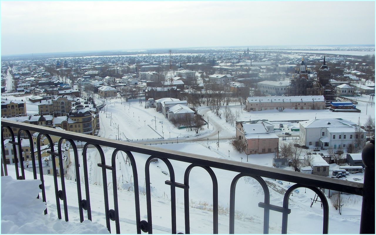 architecture, built structure, cityscape, city, building exterior, winter, snow, cold temperature, river, high angle view, transportation, clear sky, bridge - man made structure, water, sky, travel destinations, day, travel, crowded, outdoors