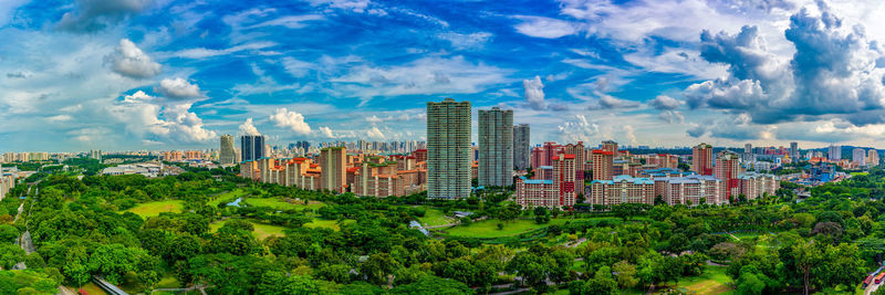 High angle view of buildings in city against sky