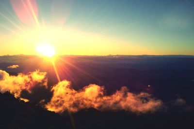 Sun shining through clouds