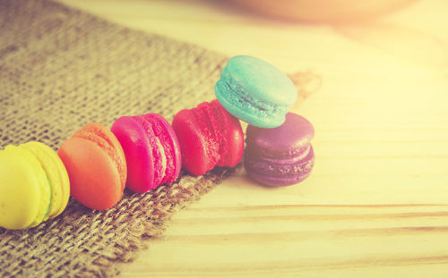 Colorful macaroons on table