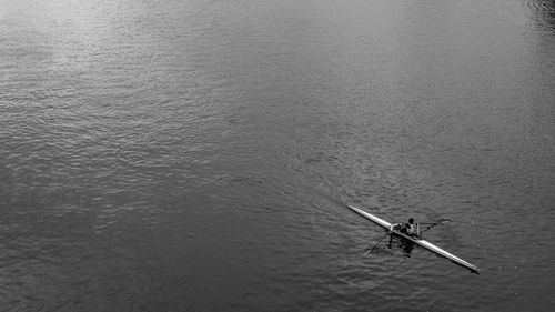 High angle view of man sculling in river