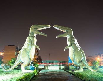 Statue of woman at night