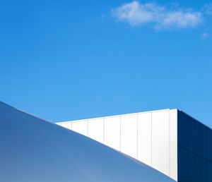 Low angle view of building against blue sky