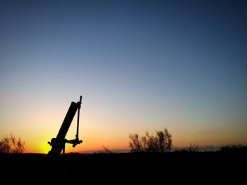 Silhouette of people at sunset